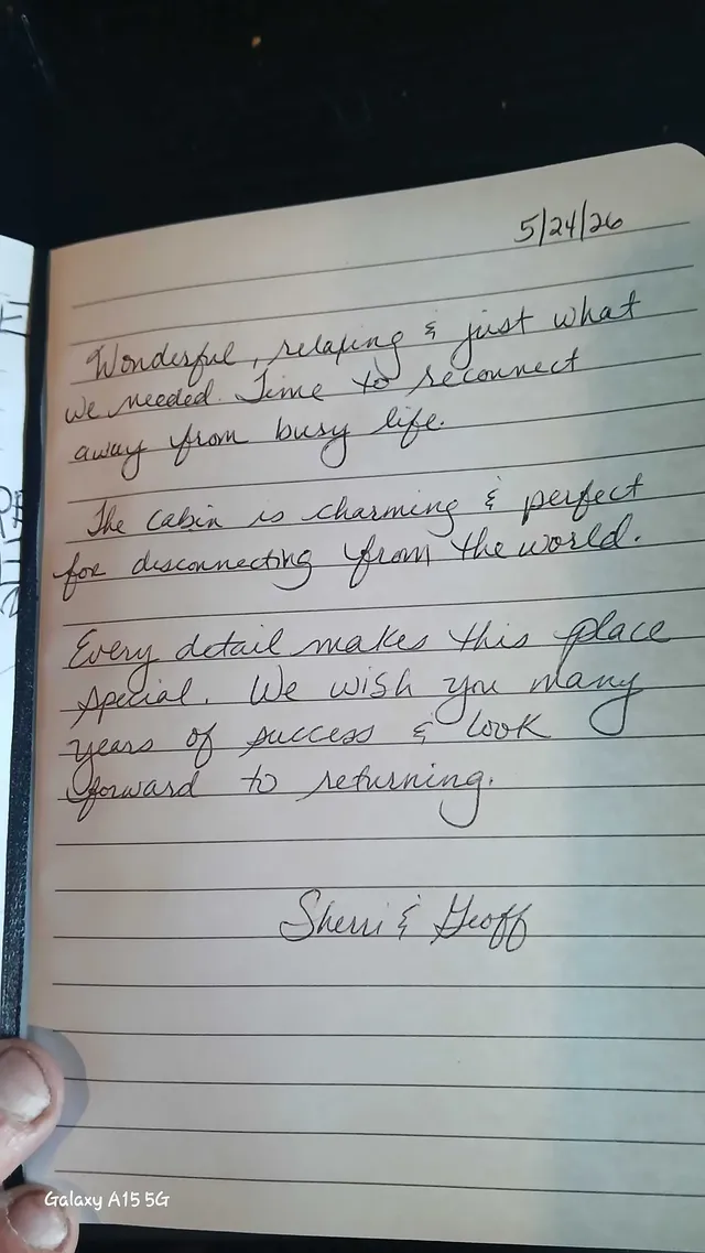 Handwritten guest journal page: 5/24/26 Wonderful, relaxing & just what we needed. Time to reconnect away from busy life. The cabin 