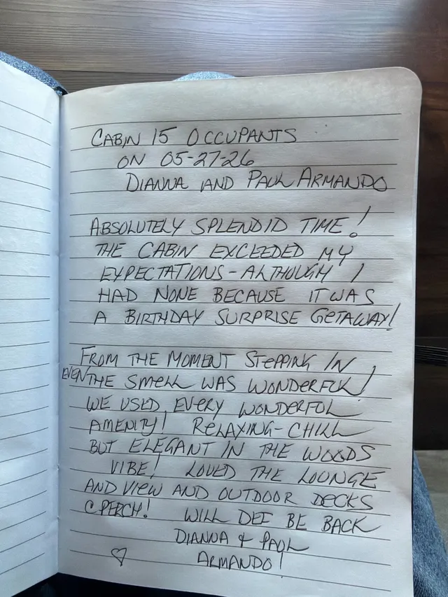 Handwritten guest journal page: Cabin 15 occupants on 05-27-26 Dianna and Paul Armando Absolutely splendid time! The cabin exceeded 