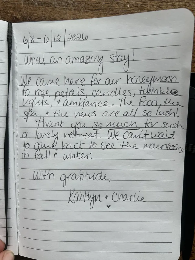 Handwritten guest journal page: 6/8-6/12/2026 What an amazing stay! We came here for our honeymoon to rose petals, candles, twinkle 
