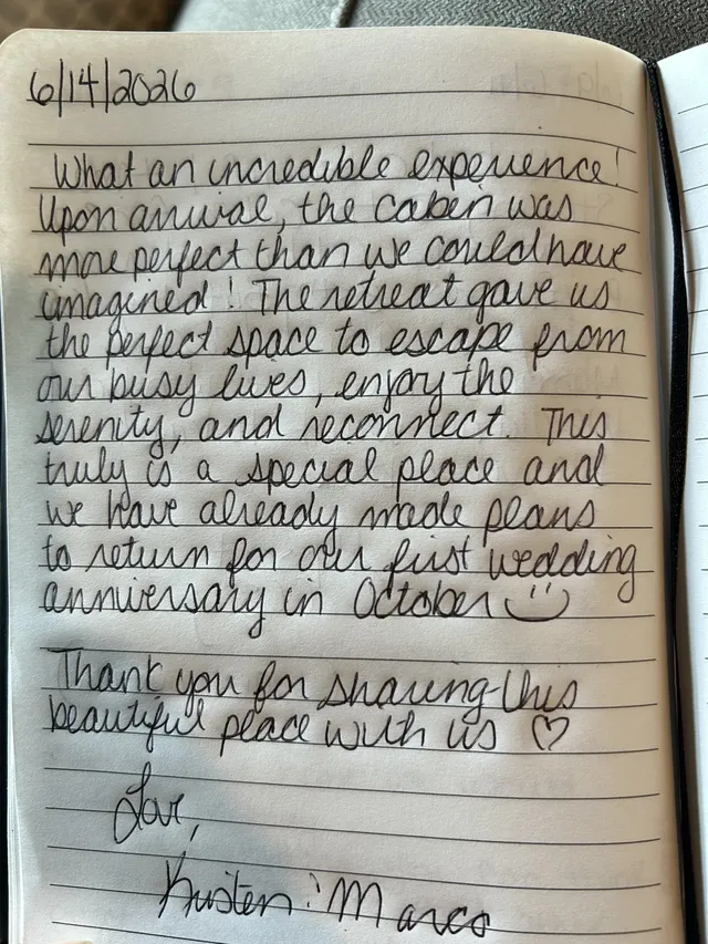 Handwritten guest journal page: 6/14/2026 What an incredible experience! Upon arrival, the cabin was more perfect than we could have