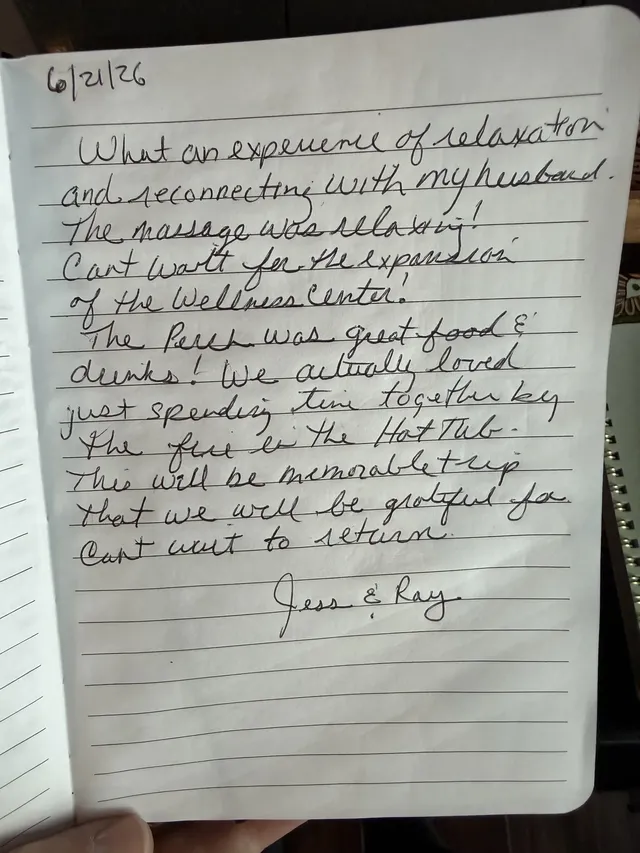 Handwritten guest journal page: What an experience of relaxation and reconnecting with my husband. The massage was relaxing! Can't w
