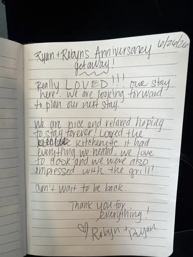 Handwritten guest journal page: Ryan + Robyn's Anniversary getaway! Really LOVED!!! our stay here. We are looking forward to plan ou