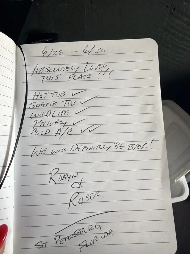 Handwritten guest journal page: 6/28 - 6/30 ABSOLUTELY LOVED THIS PLACE !!! HOT TUB ✓ SOAKER TUB ✓ WILDLIFE ✓ PRIVACY ✓ COLD A/C ✓✓ 