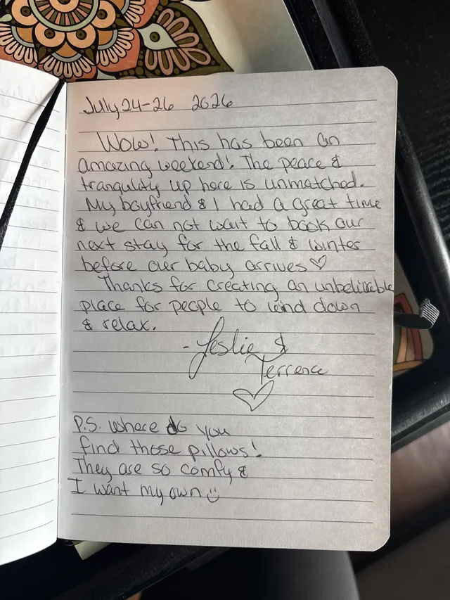 Handwritten guest journal page: July 24-26 2026 Wow! This has been an amazing weekend! The peace & tranquility up here is unmatched.