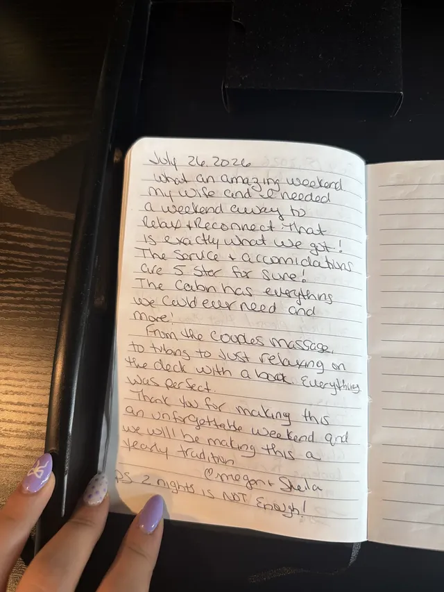 Handwritten guest journal page: July 26, 2026 What an amazing weekend. My wife and I needed a weekend away to relax + reconnect. Tha