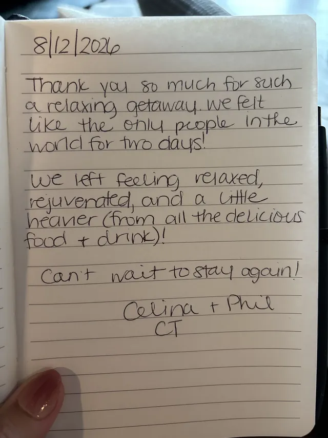 Handwritten guest journal page: 8/12/2026 Thank you so much for such a relaxing getaway. we felt like the only people in the world f