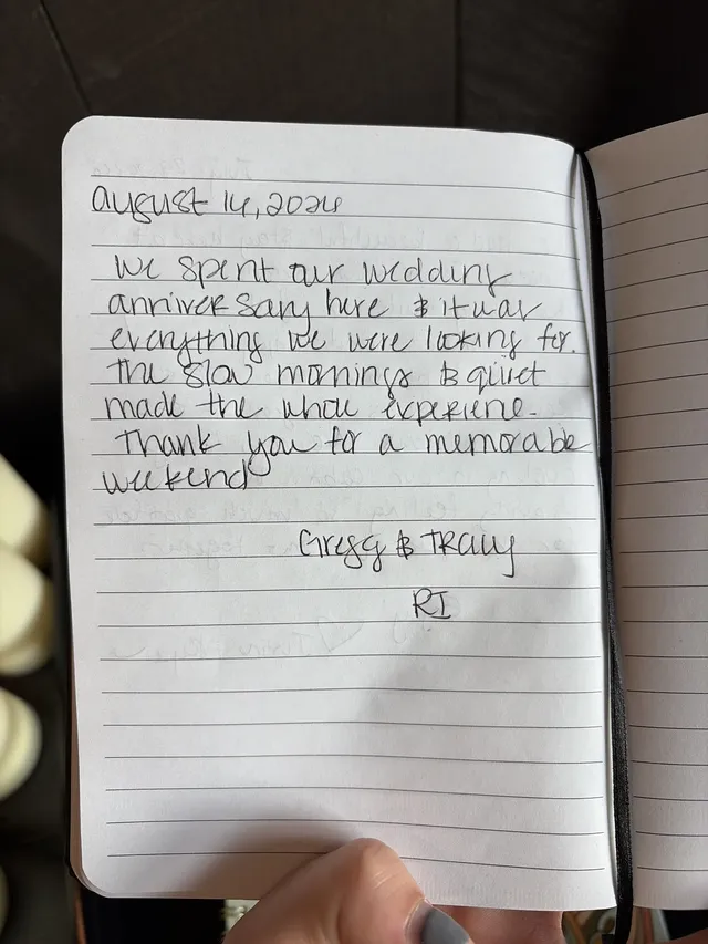 Handwritten guest journal page: August 14, 2026 We spent our wedding anniversary here & it was everything we were looking for. the s