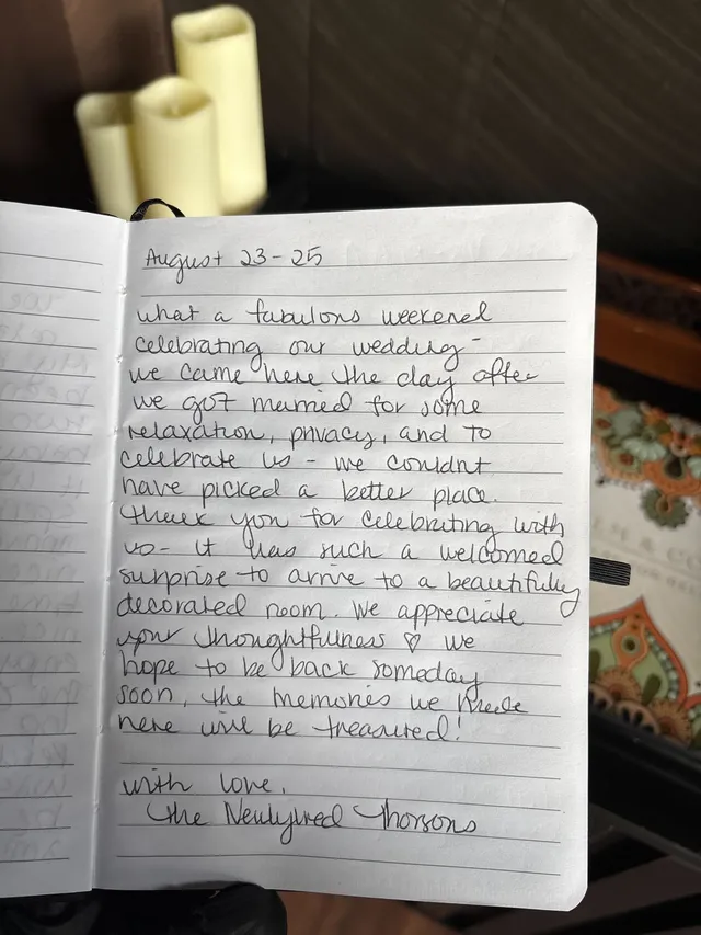 Handwritten guest journal page: August 23-25 What a fabulous weekend celebrating our wedding - we came here the day after we got mar