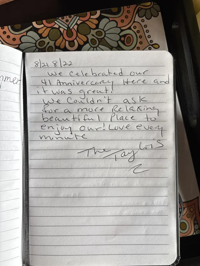 Handwritten guest journal page: 8/21 8/22 We celebrated our 41 Anniversary Here and it was great! We couldn't ask for a more Relaxin
