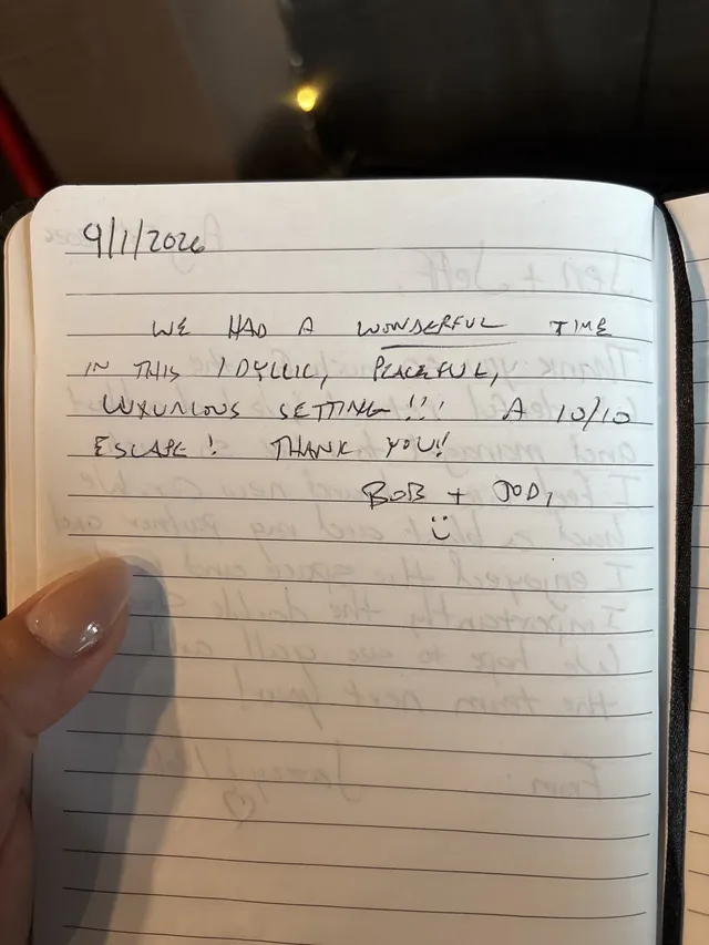 Handwritten guest journal page: 9/1/2026 WE HAD A WONDERFUL TIME IN THIS IDYLLIC, PEACEFUL, LUXURIOUS SETTING!!! A 10/10 ESCAPE! THA