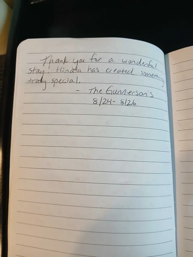 Handwritten guest journal page: Thank you for a wonderful stay! Hinata has created something truly special. - The Gunnerson's 8/24- 
