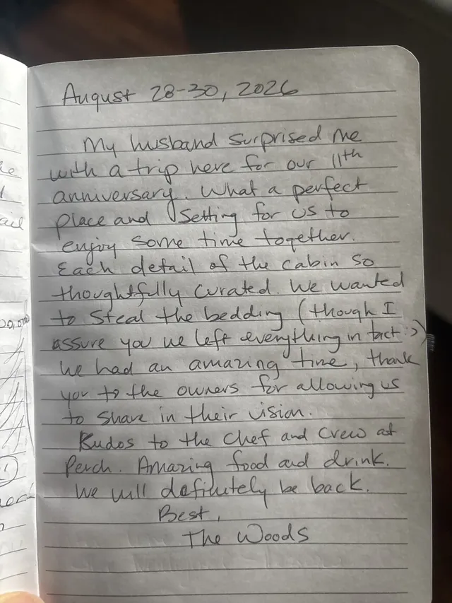 Handwritten guest journal page: August 28-30, 2026 My husband surprised me with a trip here for our 11th anniversary. What a perfect