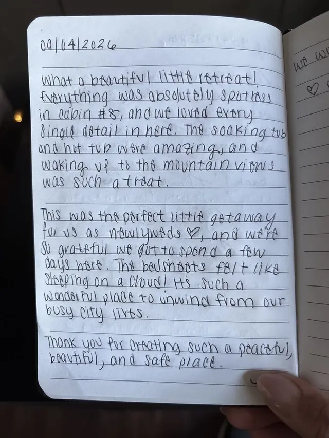 Handwritten guest journal page: 09/04/2026 What a beautiful little retreat! Everything was absolutely spotless in cabin #8, and we l