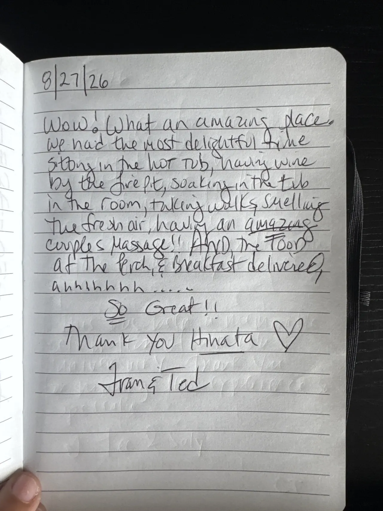 Handwritten guest journal page: we would absolutely return!! ♡ Maggie + Mikey ♡ 9/6/26 This is our 2nd time staying here to celebrat