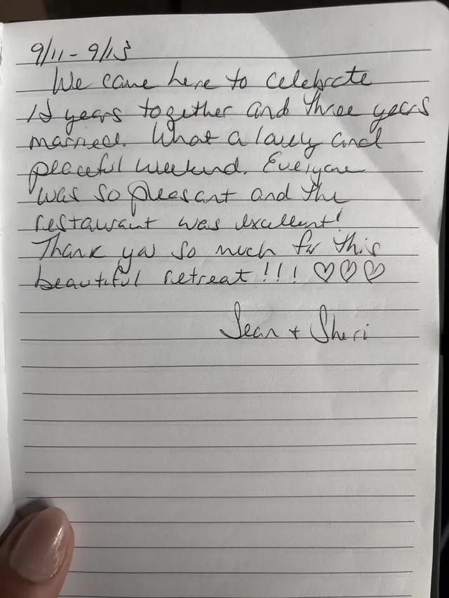 Handwritten guest journal page: 9/11 - 9/13 We came here to Celebrate 18 years together and Three years married. What a lovely and p