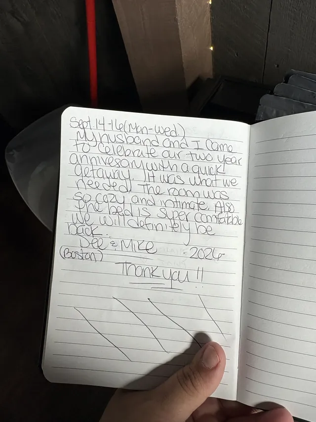Handwritten guest journal page: Sept 14-16 (Mon-Wed) My husband and I came to celebrate our two year anniversary with a quick getawa
