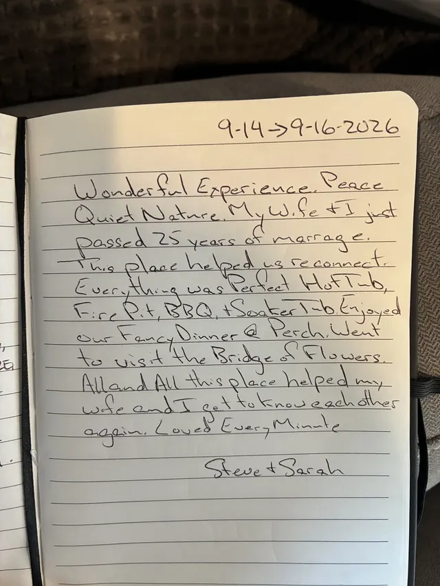 Handwritten guest journal page: 9-14->9-16-2026 Wonderful Experience. Peace Quiet Nature. My Wife + I just passed 25 years of marria