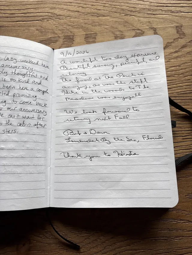 Handwritten guest journal page: 9/16/2026 A wonderful two day experience. Beautiful scenery, peaceful, and relaxing. The food at The