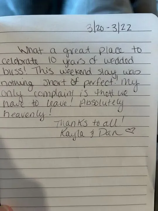 Handwritten guest journal page: 3/20 - 3/22 What a great place to celebrate 10 years of wedded bliss! This weekend stay was nothing 