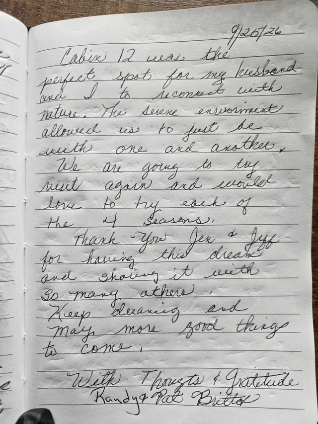 Handwritten guest journal page: 9/25/26 Cabin 12 was the perfect spot for my husband and I to reconnect with nature. The serene envi