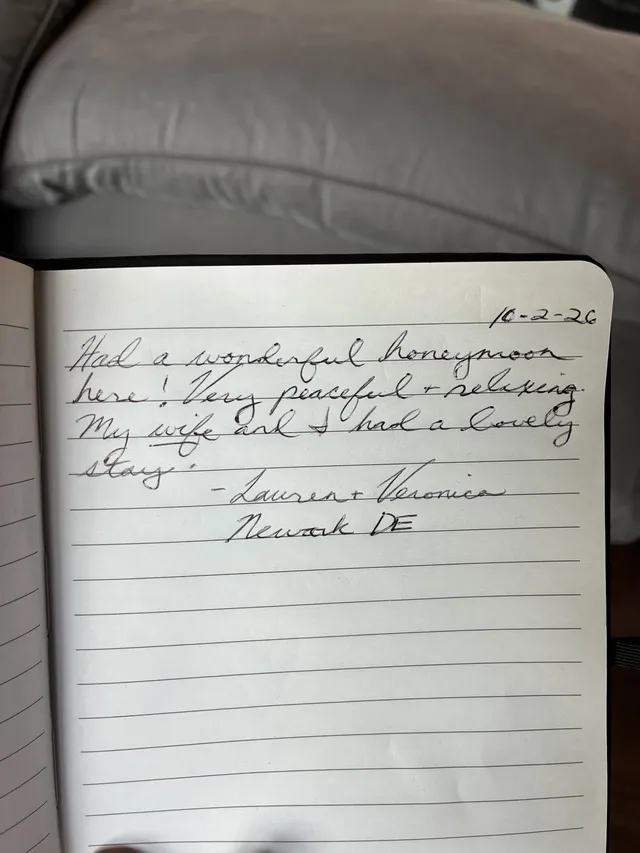 Handwritten guest journal page: 10-2-26 Had a wonderful honeymoon here! Very peaceful + relaxing. My wife and I had a lovely stay. -