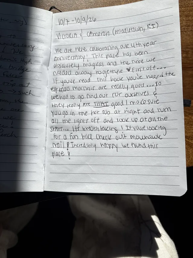 Handwritten guest journal page: 10/7-10/9/26 Victoria & Cameron (Middletown, RI) We are here celebrating our 4th year anniversary! T