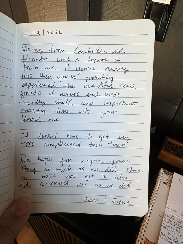 Handwritten guest journal page: 10/12/2026 Visiting from Cambridge, MA. Hinata was a breath of fresh air. If you're reading this the