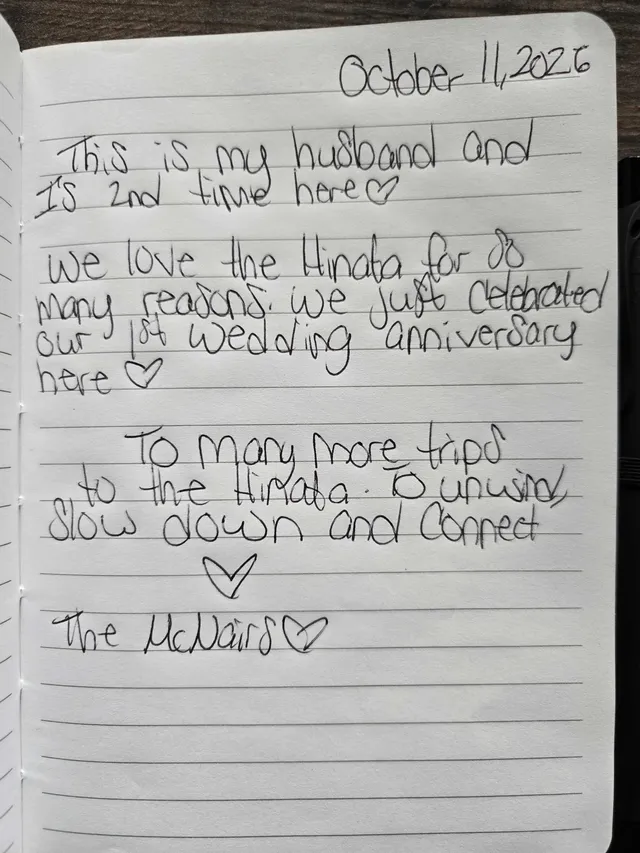 Handwritten guest journal page: October 11, 2026 This is my husband and I's 2nd time here ♡ We love the Hinata for so many reasons. 