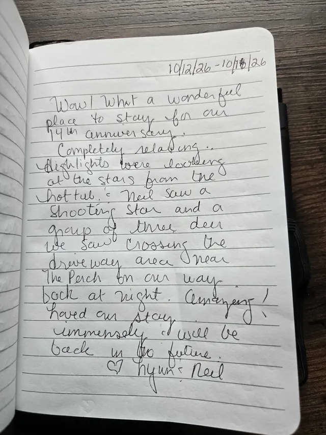 Handwritten guest journal page: 10/12/26 - 10/18/26 Wow! What a wonderful place to stay for our 14th anniversary. Completely relaxin