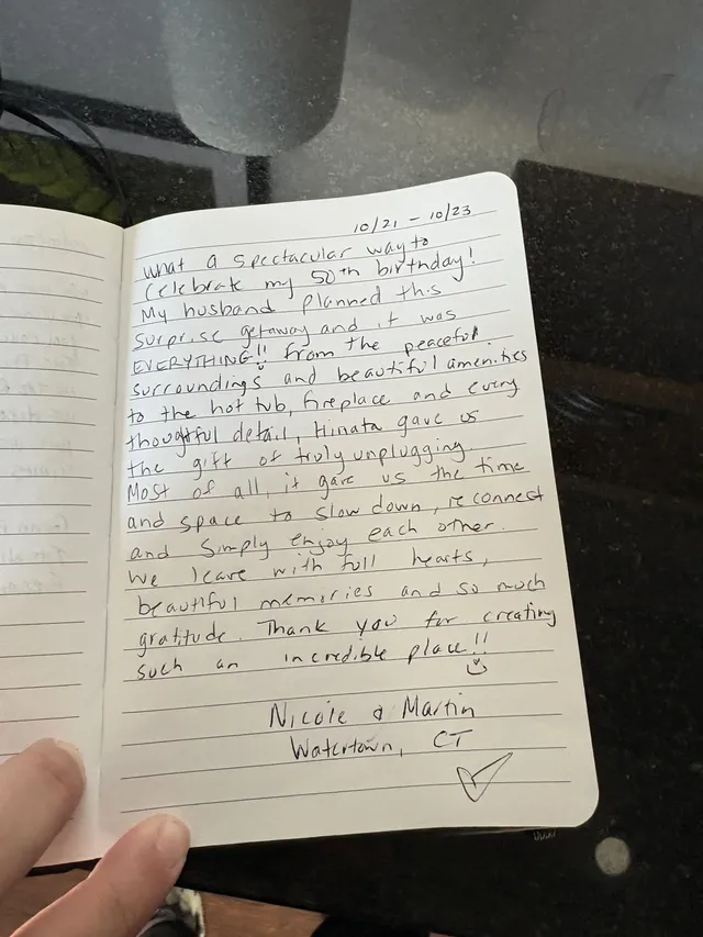 Handwritten guest journal page: 10/21 - 10/23 What a spectacular way to celebrate my 50th birthday! My husband planned this surprise
