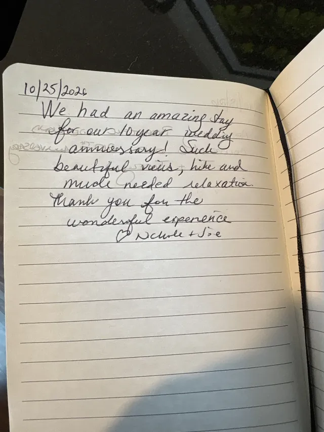 Handwritten guest journal page: 10/25/2026 We had an amazing stay for our 10 year wedding anniversary! Such beautiful views, hike an