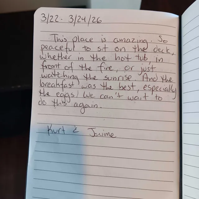 Handwritten guest journal page: 3/22 - 3/24/26 This place is amazing. So peaceful to sit on the deck, whether in the hot tub, in fro