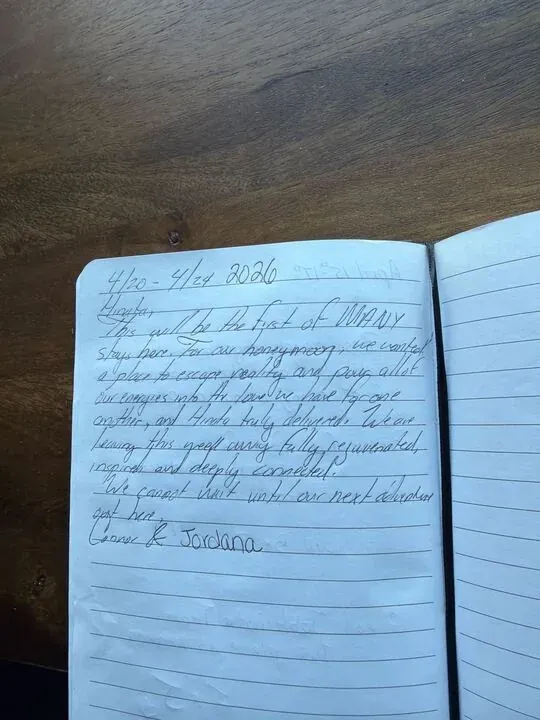 Handwritten guest journal page: 4/20 - 4/24 2026 Hinata, This will be the first of MANY stays here. For our honeymoon, we wanted a p