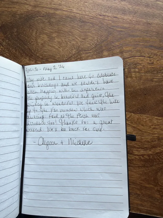 Handwritten guest journal page: April 30 - May 2 '26 My wife and I came here to celebrate our birthdays and we couldn't have been ha